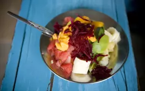 A plate of freshly made fruit salad is served at the Nairobi City Market in Kenya. According to the United Nations, global food prices have hit records highs and could rise even further in the coming years