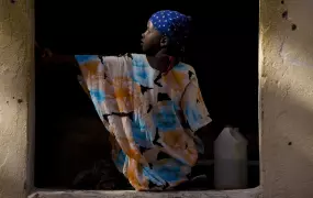 A girl prepares to wash clothes at the MSF Holland hospital laundry in Galcayo South in Puntland, Somalia. Women and children are particularly hard hit with one in twelve women dying during childbirth and one in seven children dying before their first bir