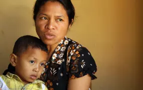 Village secretary and son in Oeperigi, Indonesia