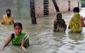 Thousands of people in Bangladesh have sought higher ground and need food and shelter due to flooding