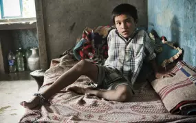 For Durga Bishwakarma, chaining her 10-year-old, drug-abusing son, Nagendra, to the family bed was her only option to deal with his drug addiction. More than 50 percent of youth in the town of Dharan are involved in drug use