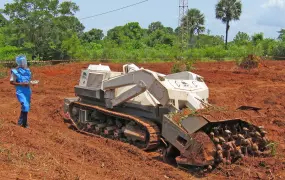 Maibata Sana demonstrates the Digger D-3 demining machine in Sindone, Casamance, Senegal