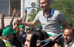 Released prisoner Eyad El-Areer makes his way through the crowd as he reaches the welcoming festival in Gaza City