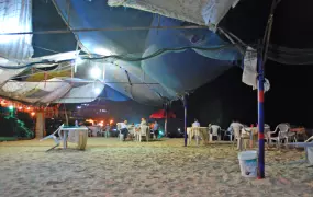 Women at a beachside restaurant close to Gaza City. The lights are powered by generators; daily electricity cuts are routine in the Gaza Strip