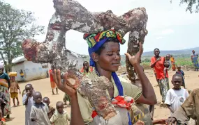 Congolese woman carrying firewood at Nakivale reception centre, Isingiro district, western Uganda