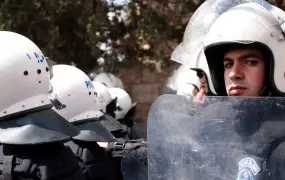 Riot police of the Palestinian Authority block access to the Bethlehem checkpoint during Land Day demonstrations on March 30, 2012