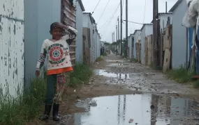 A child on the streets of Blikkiesdorp, near Cape Town, South Africa