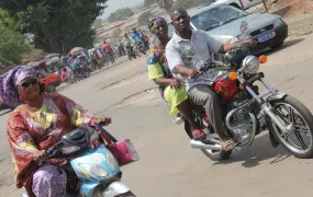 Riders on the streets of Côte d'Ivoire’s central city of Bouaké. Government is making a come-back in the northern region