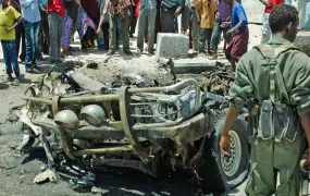 Aftermath of an explosion in front of the national theater in Mogadishu (18 March 2013)