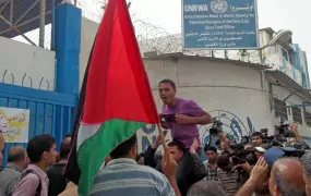 Palestinian refugees have been protesting outside the office of the UN agency for Palestinian refugees (UNRWA) in Gaza following cuts to a cash assistance programme