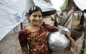 A young Rohingya girl at the Thea Chaung IDP camp outside Sittwe, western Rakhine State. Access to potable water for the camps 10,000 residents remains a challenge more than a year after sectarian violence left more than 140,000 people displaced