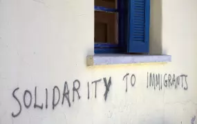 Graffiti in support of immigrants in the Greek border town of Alexandroupolis. Migrants and asylum seekers are increasingly avoiding Greece as an entry point to the European Union because of dire economic conditions, increased security at the border, and 