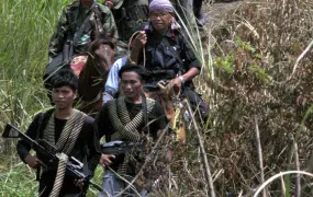 Bangsamoro Islamic Freedom Fighters (BIFF)chief Ameril Umbrakato (on horseback) leads his men in a mountain hideout in the southern province of Maguindanao (2011)

TO REPLACE 201208160634440090