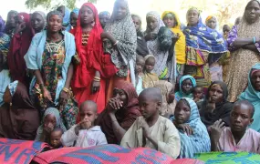 Displaced and host families in Gasseré village on the border of Niger and Nigeria, wait for non-food items to be distributed by UNHCR on 26 January. Their village, Gashakar, in Borno State, was attacked by Boko Haram militants on 18 January, causing 200 