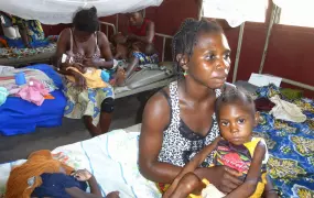 Malnourished child with mother at the Complexe Pediatrique (children's hospital) in Bangui, CAR