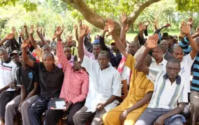 A meeting of community leaders in Kyangwali refugee settlement, western Uganda