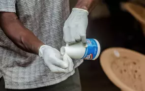 An MSF health worker at their Kailahun Ebola treatment centre.