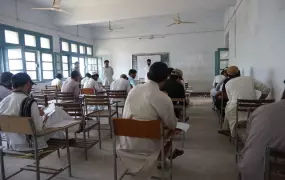 Students from North Waziristan sit for their first year college examinations in Bannu