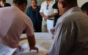 UN workers explain the new call centre to the heads of a number of camps for the displaced in Iraq