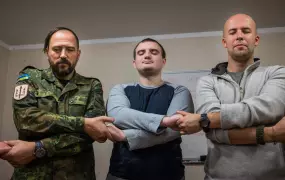 Soldiers hold hands during one of the exercises in a workshop organised by Wounded Warrior Ukraine. A part of the problem lies with the fact that mental illness is still a stigma in the Ukraine and soldiers have a hard time reaching out for help.