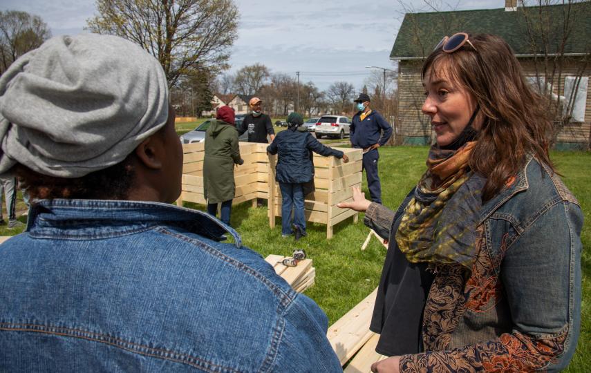 Breathe Free Detroit campaign organiser KT Andresky works with members of a community garden on a compost collection bin for a pilot programme in Detroit. Her group is consulting with the Mother Earth Foundation in The Philippines on best practice.