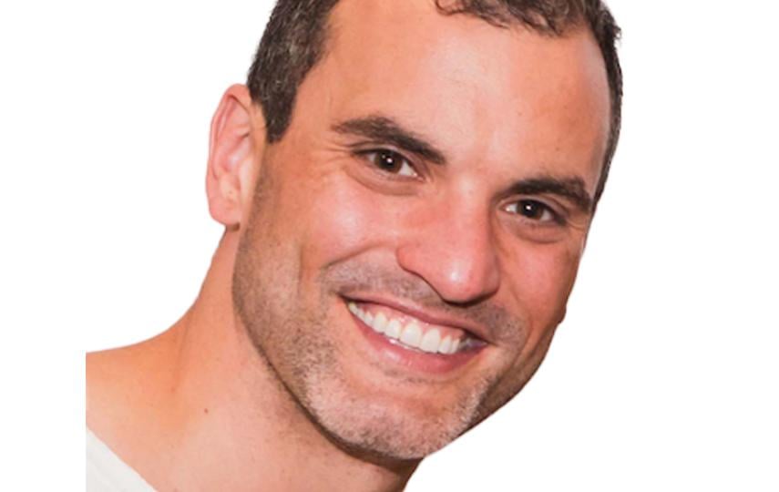 A headshot of Adam Lichtenheld