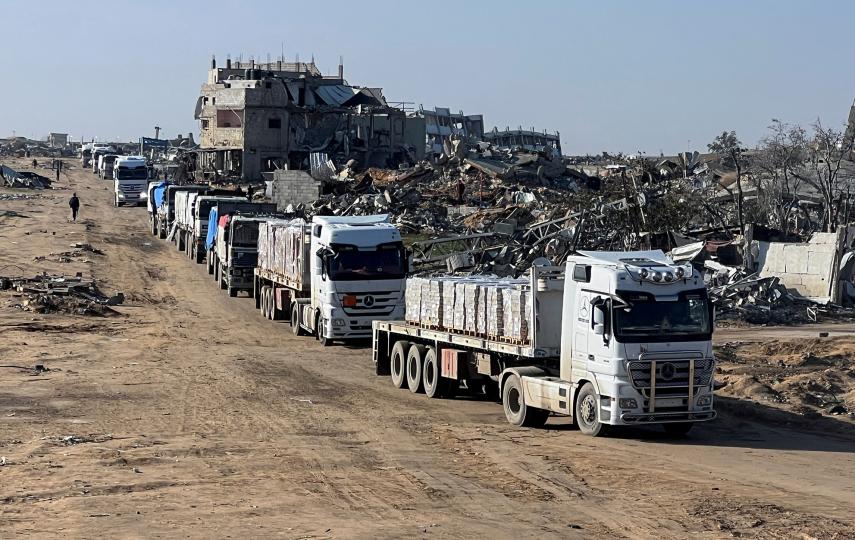 Trucks carrying aid move, amid a ceasefire between Israel and Hamas, in Rafah in the southern Gaza Strip, February 13, 2025.