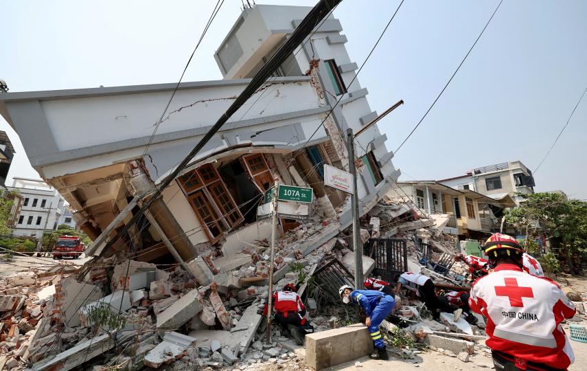 Members of the Chinese Red Cross International Emergency Response Team work at a collapsed residential building following the earthquake, in Mandalay, Myanmar March 31, 2025. 