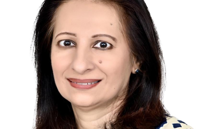 A headshot of Themrise Khan.