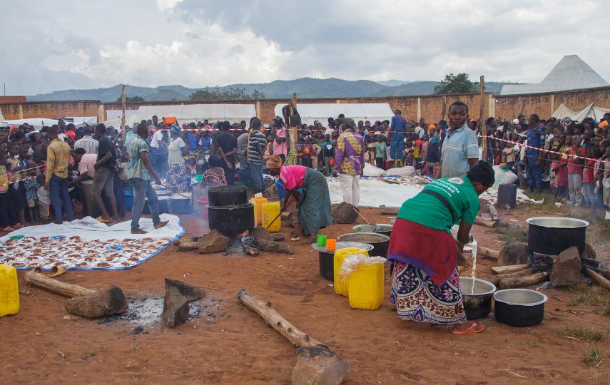 Burundian volunteers prepare food for Congolese families at Rugombo Stadium, after Congolese fled from renewed clashes between M23 rebels and the Armed Forces of the Democratic Republic of the Congo (FARDC), in Rugombo commune of Cibitoke Province, Burundi February 18, 2025.