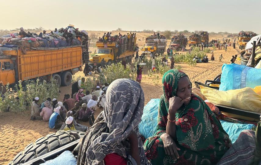 Families escaping RSF attacks on the famine-hit Zam Zam displacement camp arrive with their belongings on trucks in Tawila, a small town in North Darfur state that has become an epicenter of Sudan's displacement crisis.