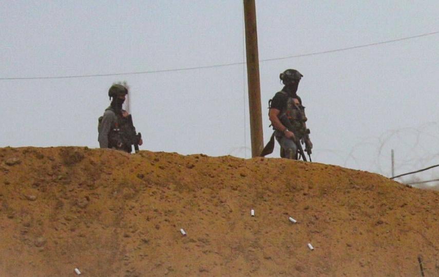 Security contractors working for the US-backed Gaza Humanitarian Foundation (GHF) stand guard, on 1 August 2025. The GHF has been condemned for militarised food distributions where Israel has killed hundreds of Palestinians.