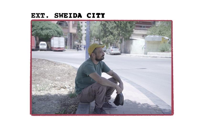 A man called Radwan sits at the edge of a curb and looks towards the right of the image. The photo is stylised to look like a storyboard scene. Above the image it reads: EXT. SWEIDA