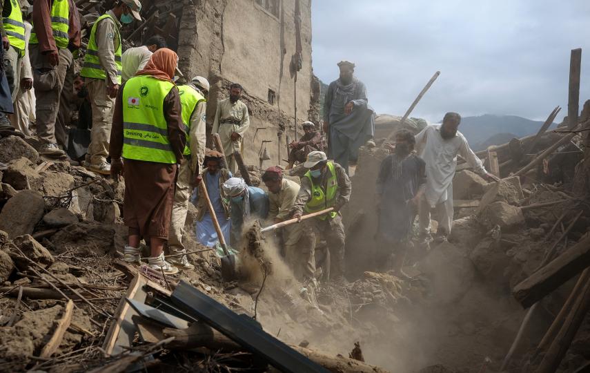 Rescue workers clear debris of a damaged house after a deadly magnitude-6 earthquake that struck Afghanistan on Sunday, in Mazar Dara, Kunar province, Afghanistan, September 2, 2025. 