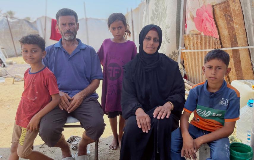 Sahar al-Qassas, her husband, and three of their children in al-Massmiya displacement camp in Deir al-Balah, Gaza Strip.