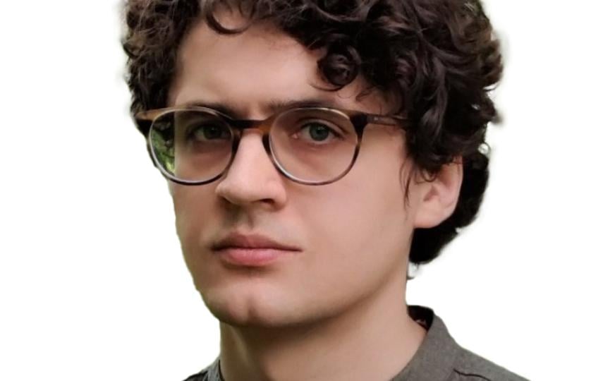 A headshot of Arsenii Alenichev.