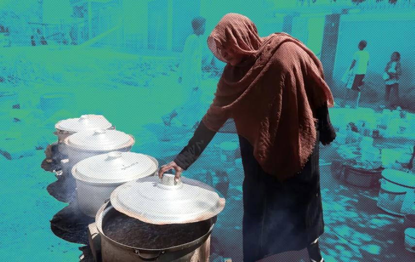 A Sudanese woman prepares food at a community kitchen during Ramadan in the Omdurman area of Khartoum, Sudan's capital.
