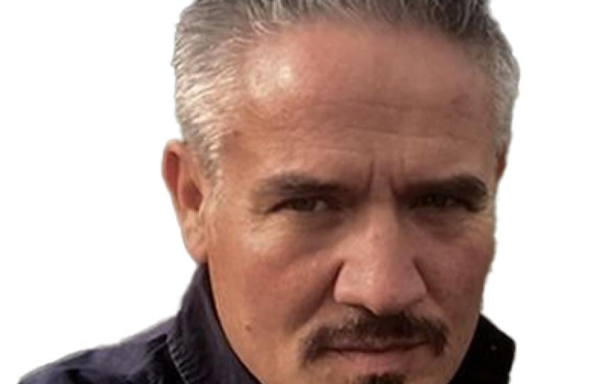 A headshot of Dr. Alan Nicol. 