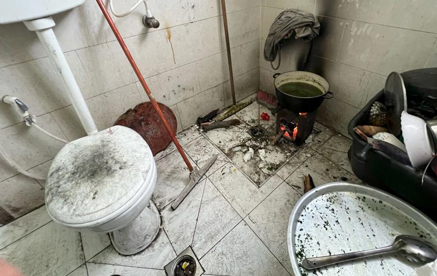 Food pots in the toilet part are seen amidst hard living conditions as Gazans, displaced due to ongoing Israeli attacks, grapple with tragic living conditions in Jabalia, Gaza on 9 March, 2024.