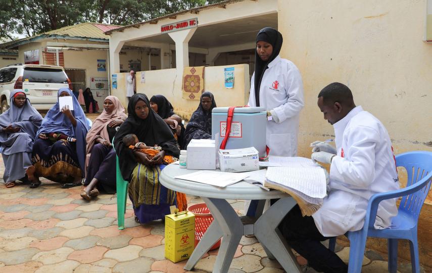 A nurse from Save the Children prepares to administer vaccination to internally displaced Somali children in Baidoa, Somalia June 25, 2025. 