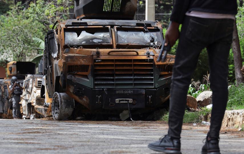 Armored vehicles burned by gang members are seen on the street after an operation by the Haitian National Police and the Multinational Security Support (MSS) mission to recapture the Teleco communications site and surrounding community from armed gangs, on the outskirts of Port-au-Prince, in Kenscoff, Haiti August 26, 2025.