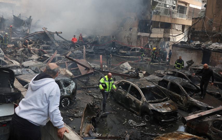 Emergency responders at the site of an Israeli strike in Beirut, 8 April 2026.