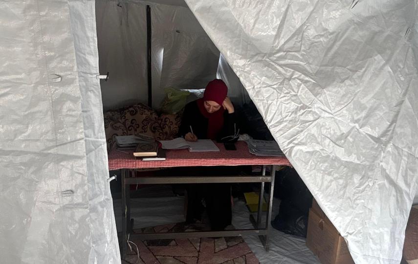 Journalist Mohamed al-Astal’s 17-year-old daughter Dana studying for her high school matriculation exams in a tent in al-Mawasi, Gaza.
