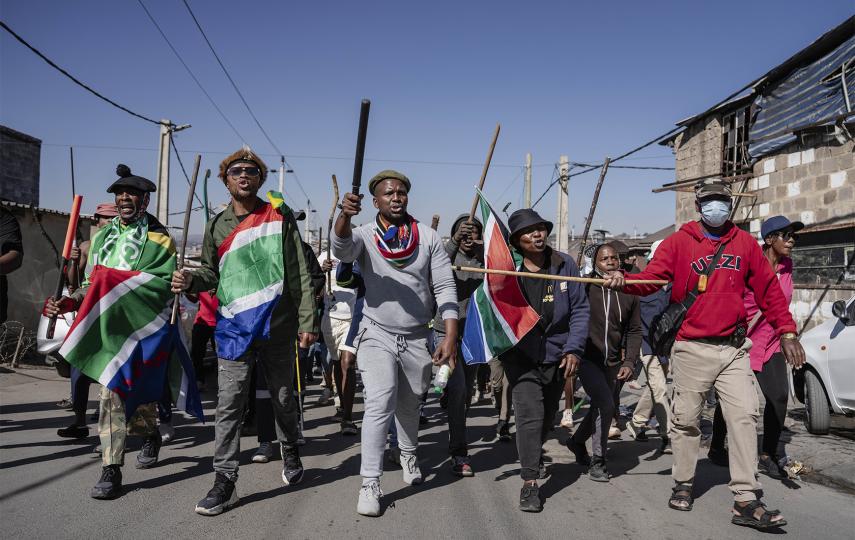 An anti-migrant group of dozens of people hold a protest in the Alexandra township of Johannesburg, South Africa on 16 July 2026. 
