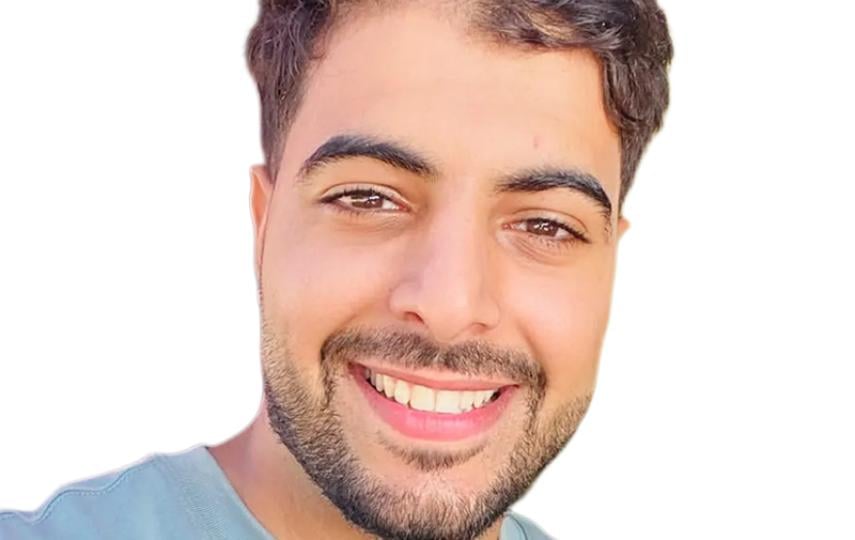 A headshot of Hassan Herzallah.