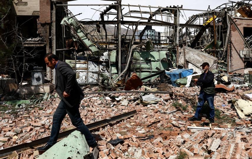 People inspect the damage at the research building of the Shahid Beheshti University, which was damaged by a strike, amid the U.S.-Israeli conflict with Iran, in Tehran, Iran, 4 April 2026. 