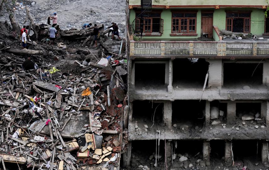 Pictured are people search for belongings in the debris of a collapsed house following the deadly flash floods and a mudslide, in Trishuli, Nuwakot district, Nepal, 5 September 2026.