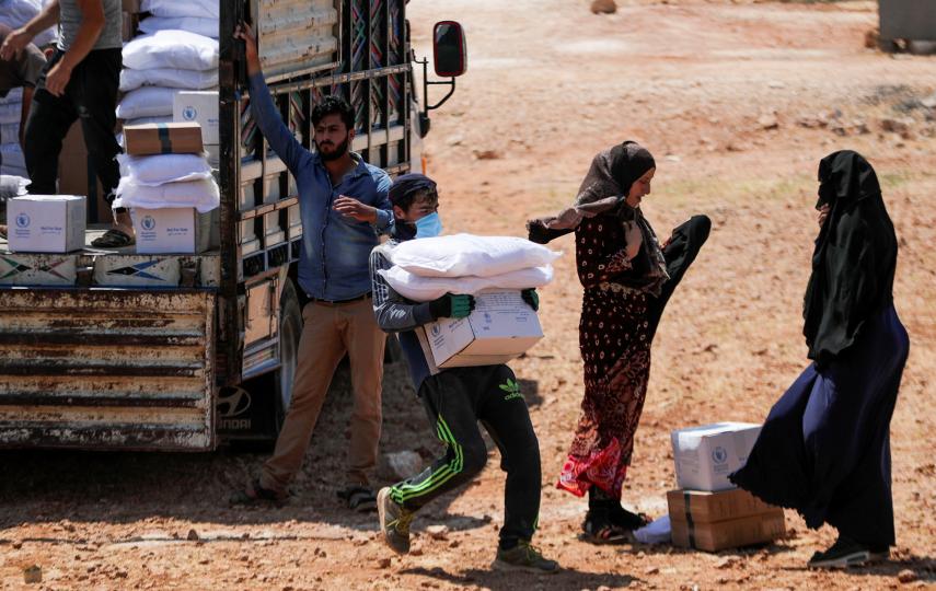 An aid delivery in rebel-held Idlib, northwest Syria, in June 2021.