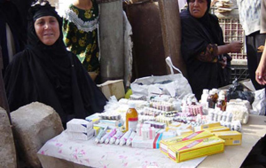 [Iraq] Woman sells stolen medicines in Basrah market.