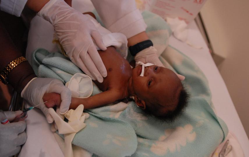 A nurse draws blood from an infant at the Baylor Children’s Centre of Excellence in Maseru, Lesotho. Thirty percent of the 1,150 children accessing antiretroviral treatment in Lesotho are receiving it at this clinic